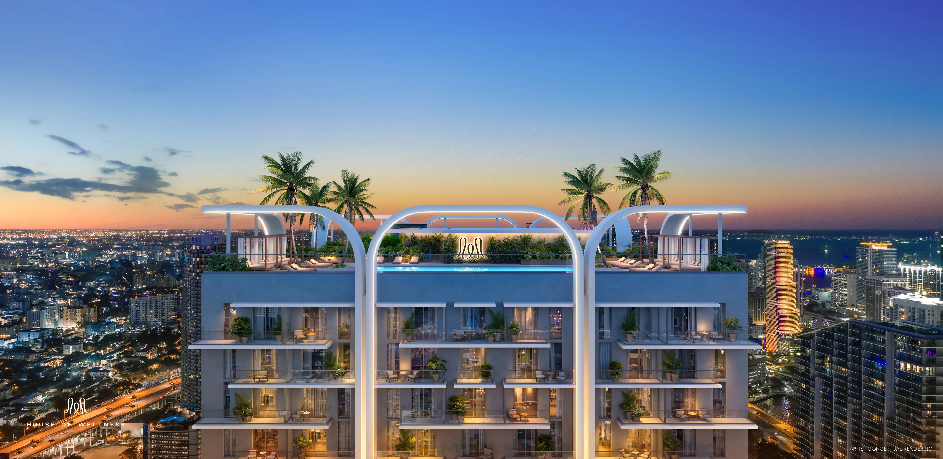 Rooftop pool at sunset overlooking Biscayne Bay