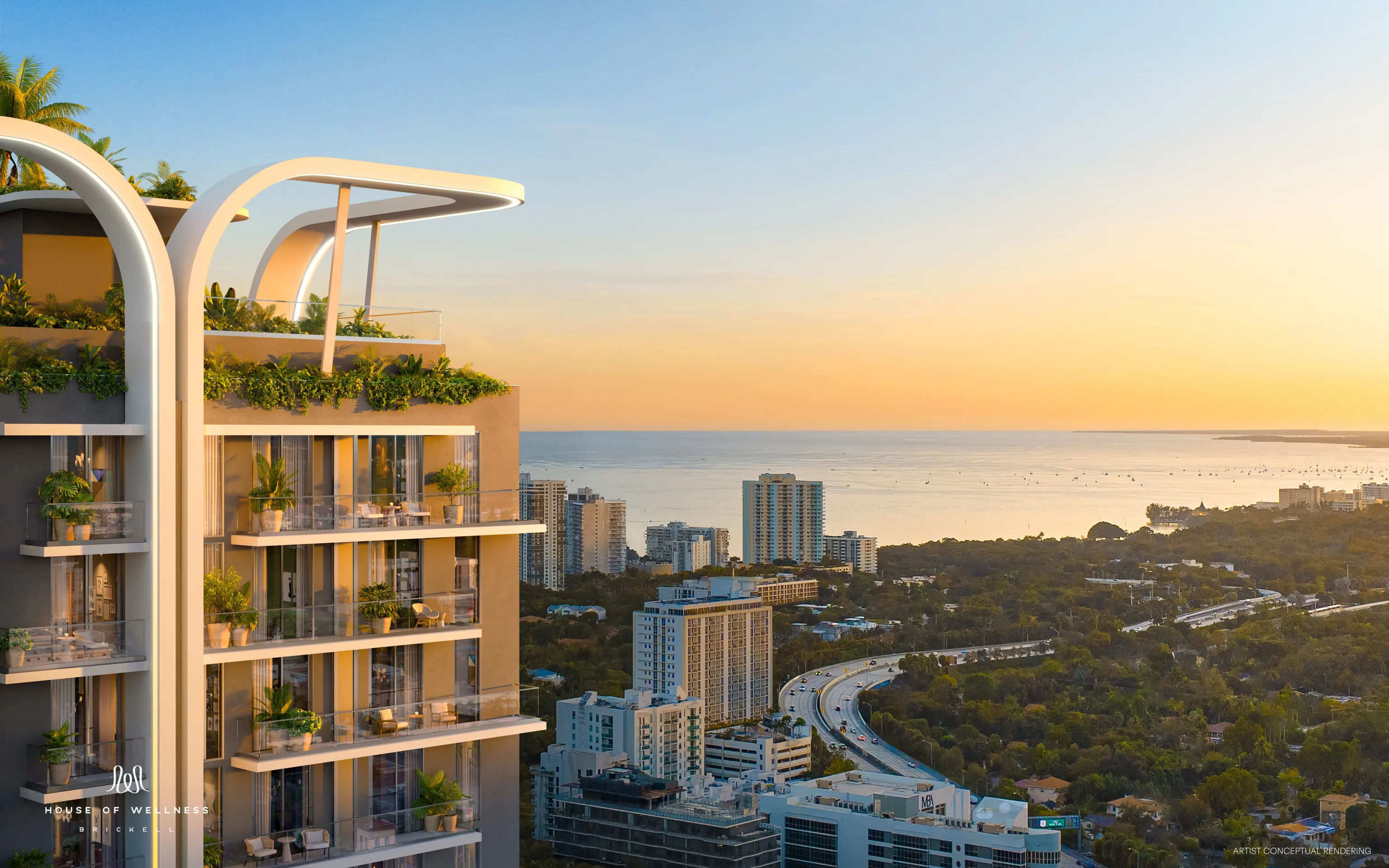 Exterior view at sunset facing the bay from the south side of the building